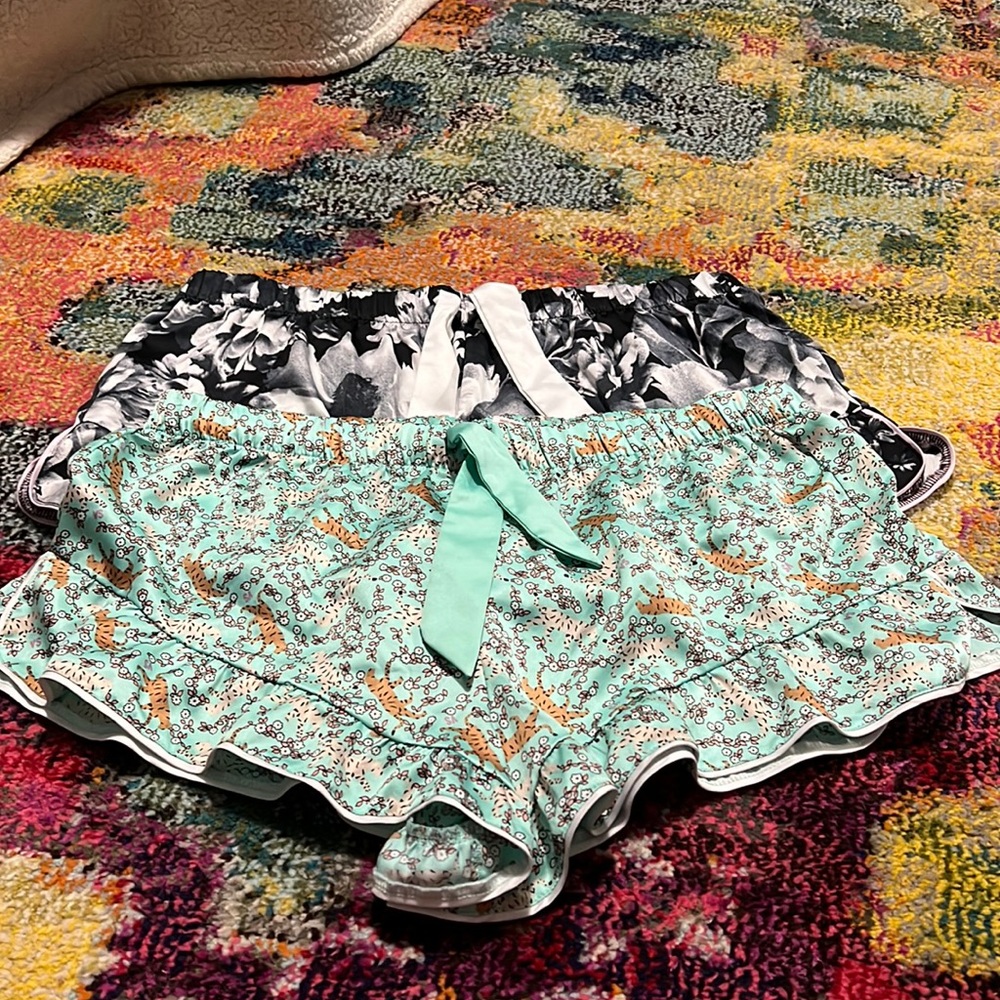 Two pairs of Vcitoras Secret satin sleep shorts, never worn.
